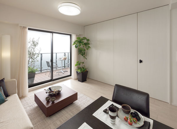Living.  [Living-dining Wall door CLOSE] As a separate room if I close my door, Such as a den or nursery, In a space that can be utilized in a multi-purpose.