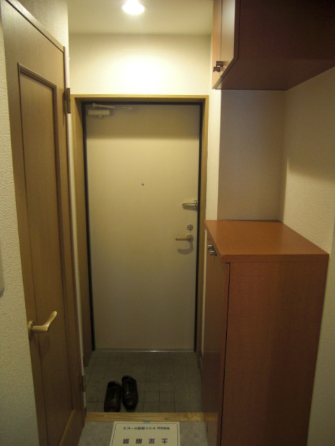 Entrance. With cupboard