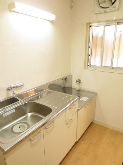 Kitchen. Spacious with two-burner stove correspondence of kitchen