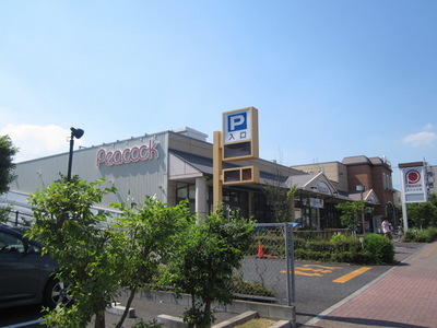Supermarket. Peacock Tamagawa 412m to the store (Super)