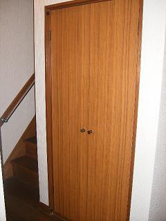 Entrance. Front door storage cupboard