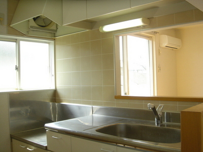 Kitchen. Abundant storage with a hanging cupboard