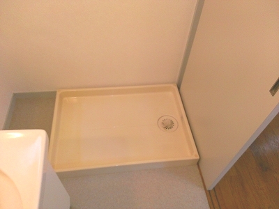 Other room space. Laundry Area is located next to the wash basin. 