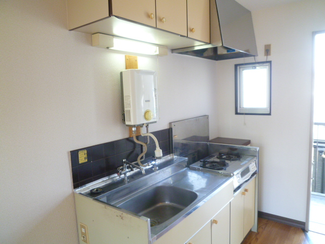 Kitchen. Spacious is a two-burner gas stove with a kitchen