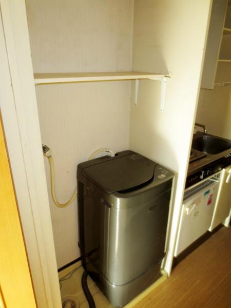 Other local. It is indoor washing machine Storage. There is also enough breadth.