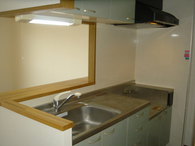 Kitchen. Storage-rich kitchen with hanging cupboard