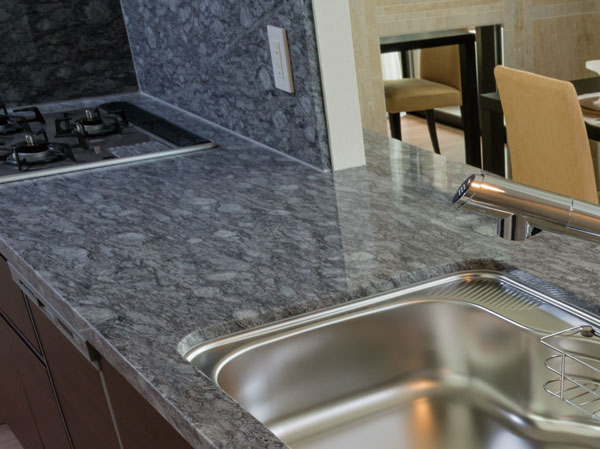 Kitchen.  [Natural granite counter tops] The kitchen counter top, Adopt a granite having both high texture and durability. It will produce beautiful space you use every day.