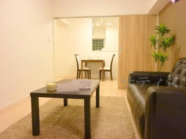 Living. It is the flooring of the room