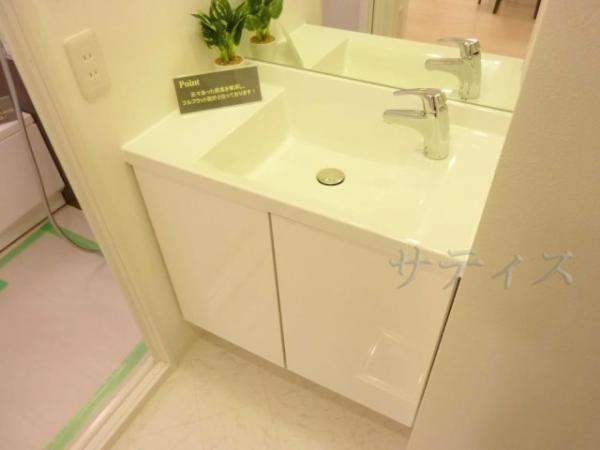 Wash basin, toilet. Clean wash basin