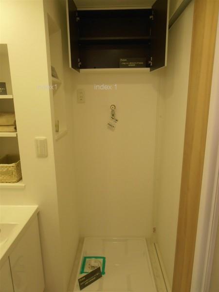 Wash basin, toilet. There is also indoor washing machine Storage!