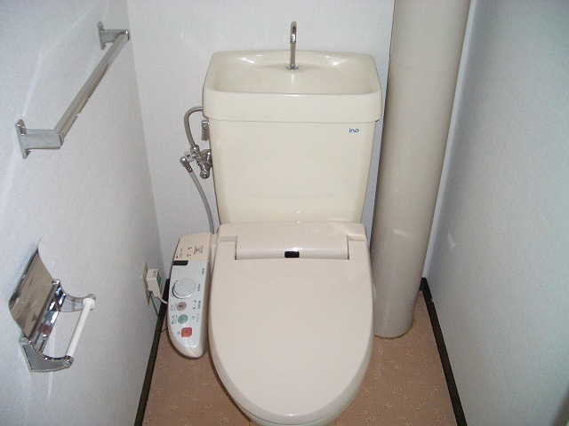 Toilet. Washlet comes with a.