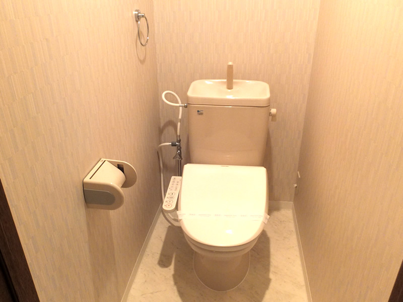 Toilet. Clean white floor is popular. Washlet is with