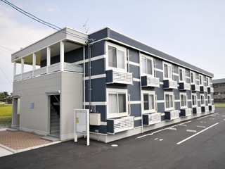 Building appearance. Cool appearance in blue hanging gray! With Covered bicycle parking