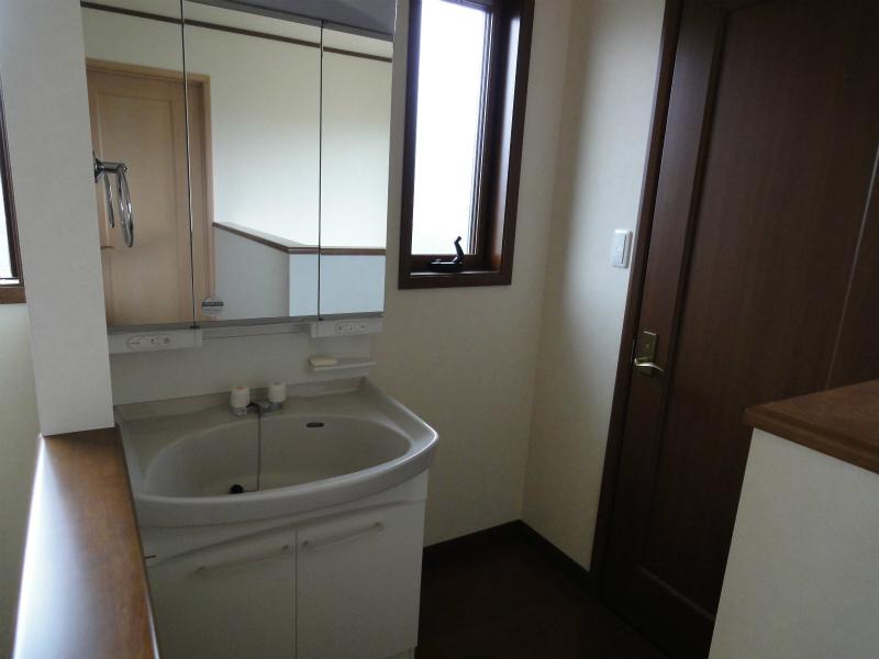 Wash basin, toilet. There is a wash basin also on the second floor.