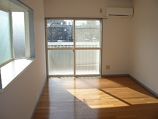 Living and room. With bay windows in the corner room