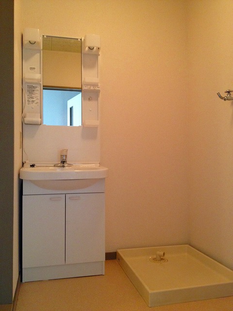 Washroom. Washing machine in the room ・ Bathroom vanity