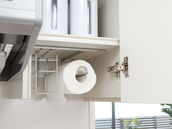 Kitchen.  [Storage hanger] We established a convenient hanger can be stored Hook the kitchen paper and wrap.